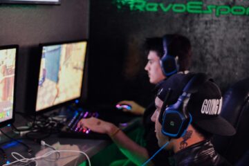 Gamers playing on a desktop PC for the top esports betting markets of 2025